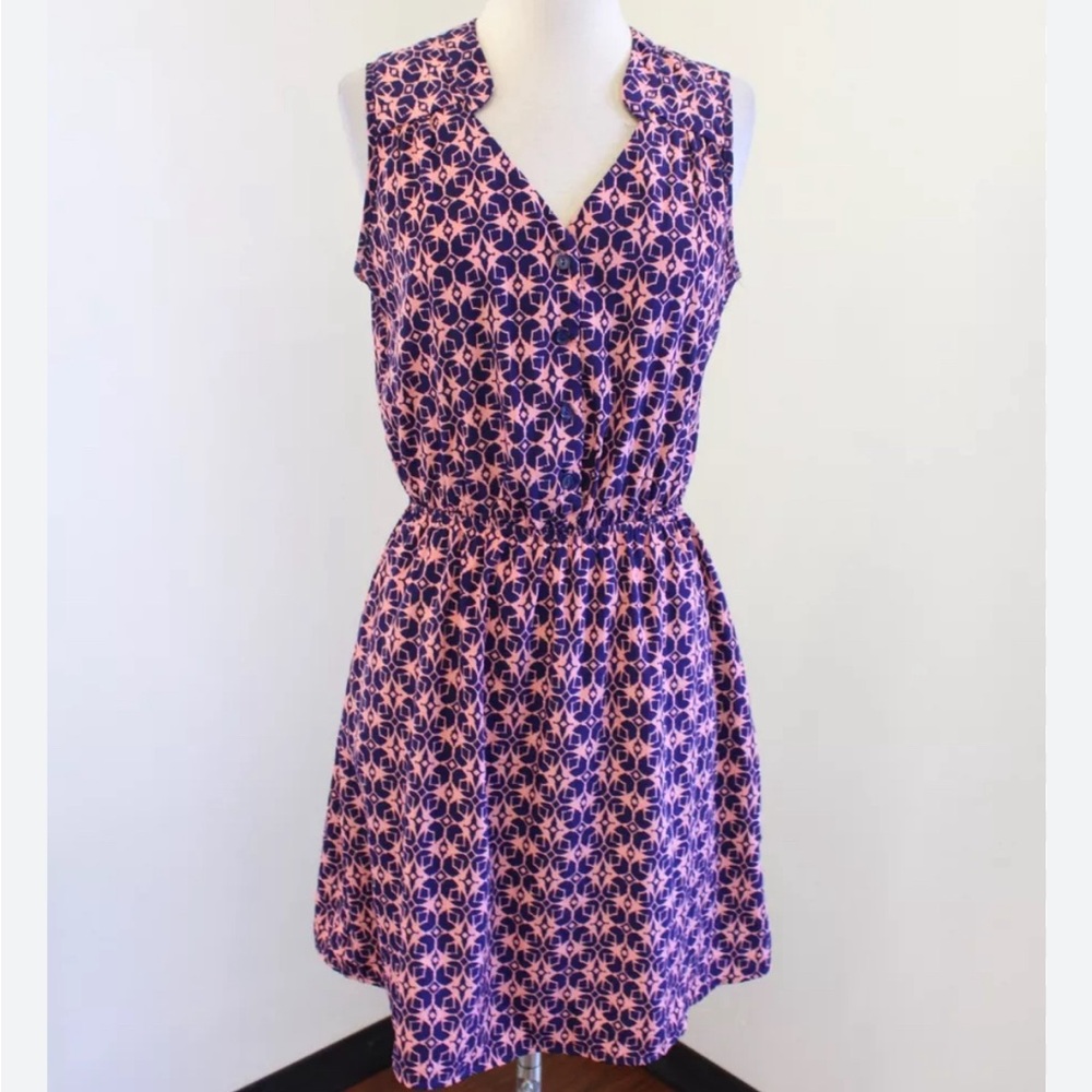 Knee length shirt dress.